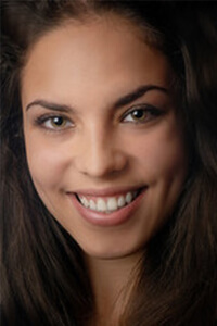 Picture of a young woman smiling back at the camera
